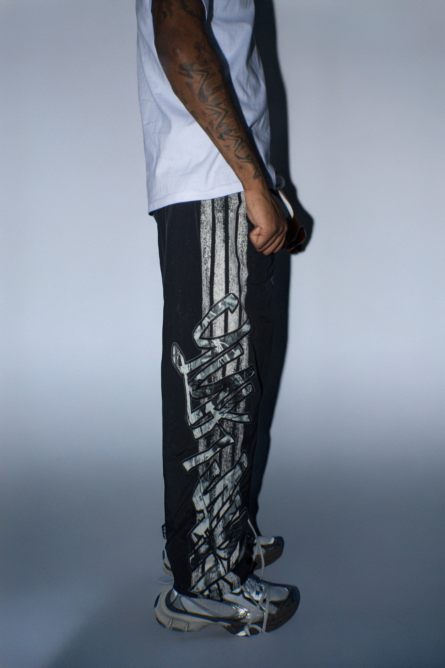 YUKARI NYLON TRACK PANTS- BLACK